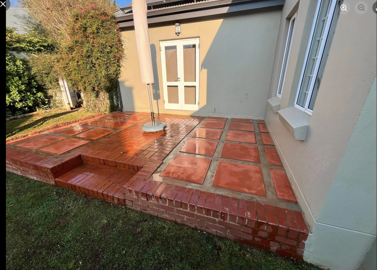 Wet-look sealed clay tile patio — Southdowns Estate, Irene